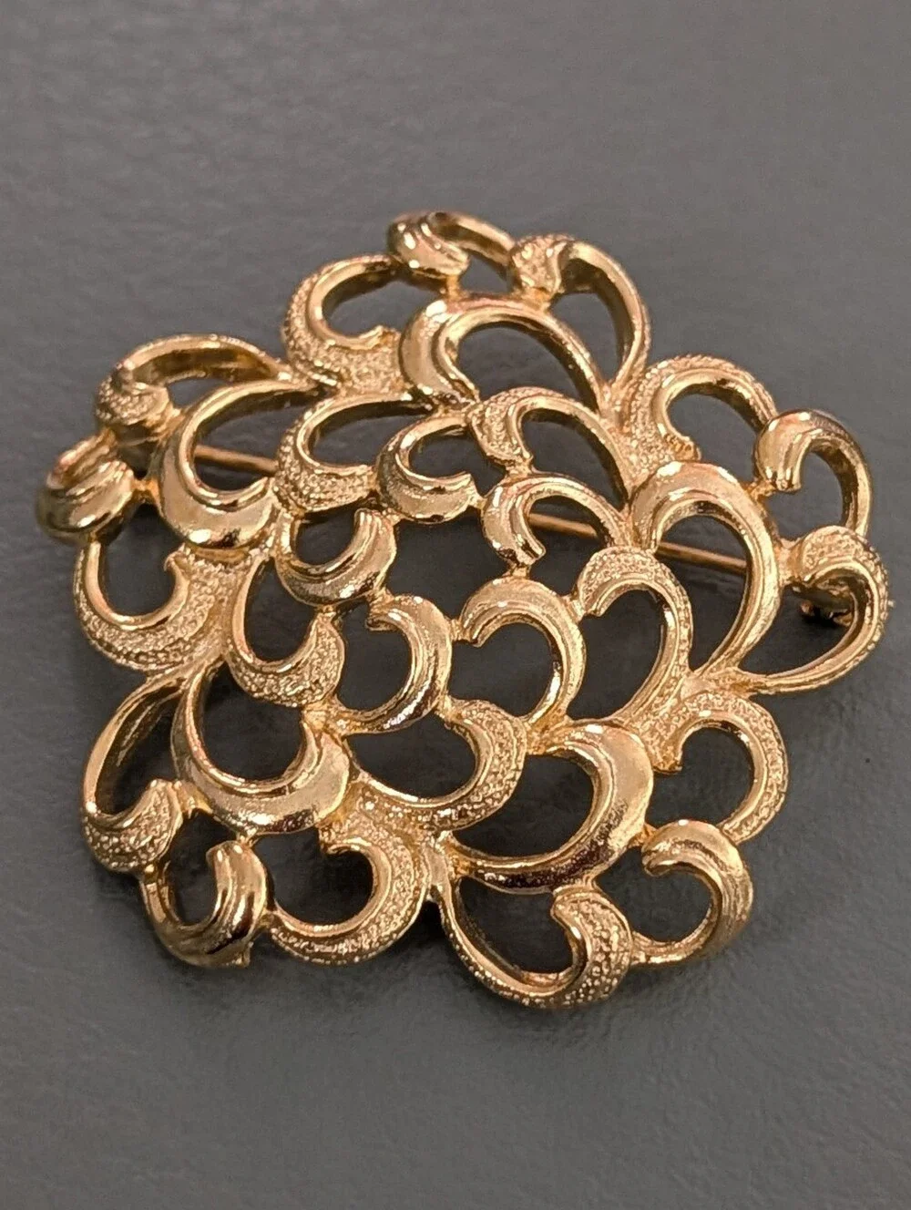 Gold Tone Textured Floral Openwork Or Scroll Design Brooch